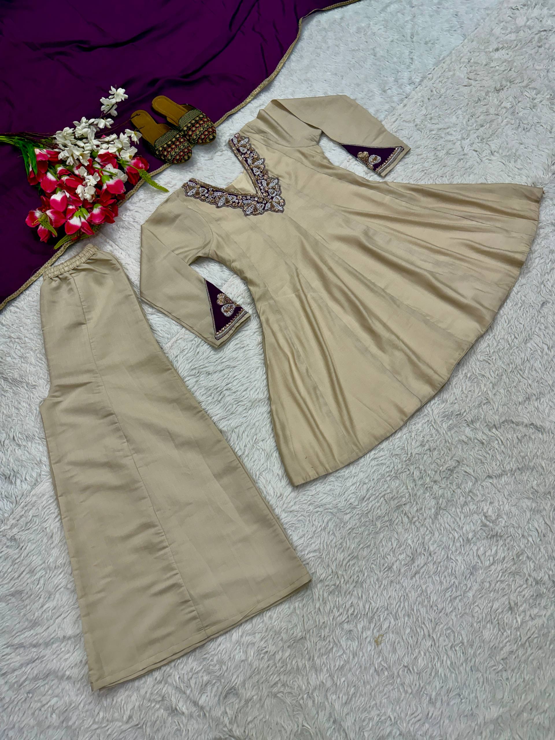 Regal Cream Silk Peplum Kurti and Flared Palazzo Suit Set Adorned with Ornate V-Neck Embroidery and a Rich Plum Purple Dupatta